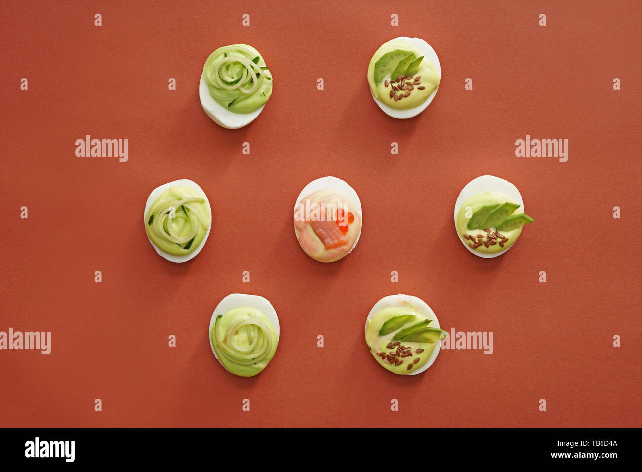 Tasty deviled eggs on color background Stock Photo