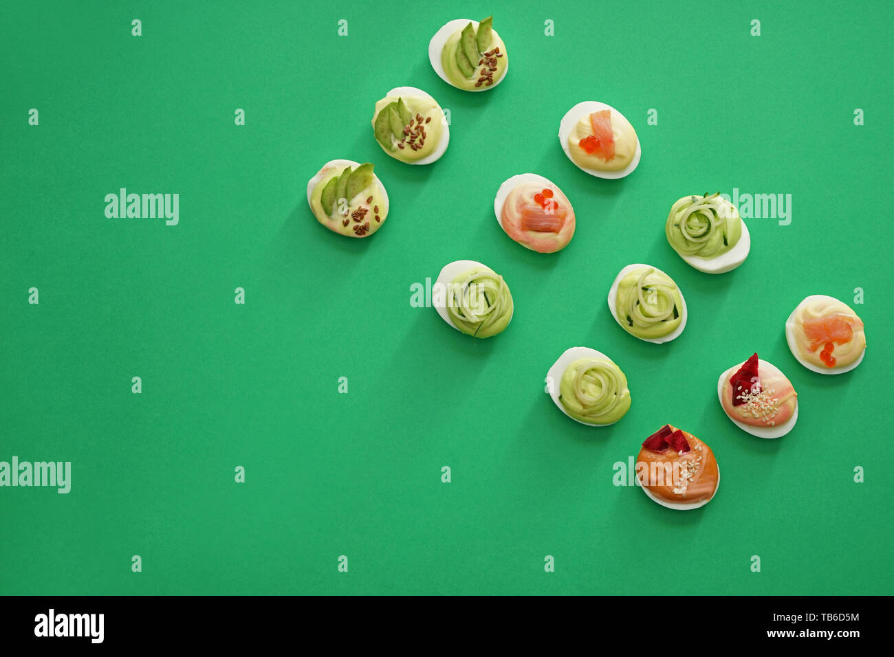 Tasty deviled eggs on color background Stock Photo
