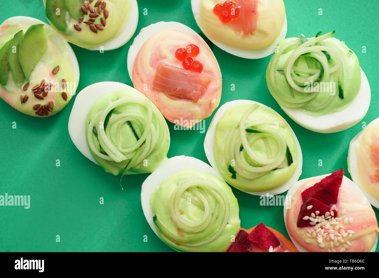 Tasty deviled eggs on color background Stock Photo