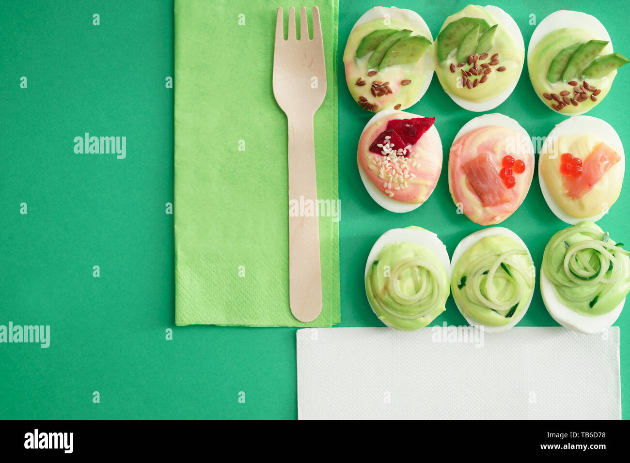 Composition with tasty deviled eggs on color background Stock Photo