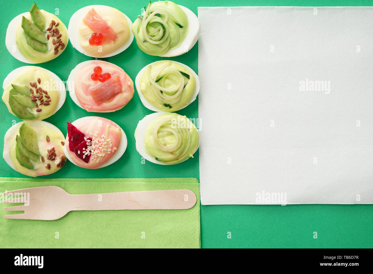 Composition with tasty deviled eggs on color background Stock Photo