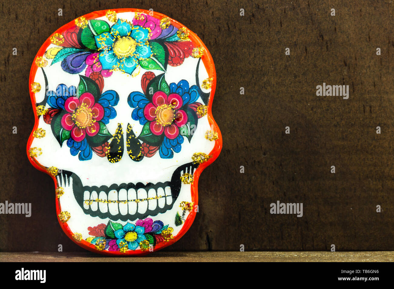 Colorful ceramic skulls exposed in flea market Stock Photo