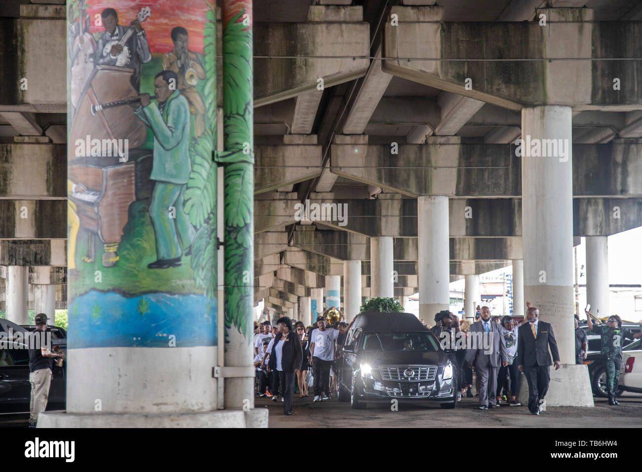 New Orleans, Louisiana A funeral procession with dancing and a brass