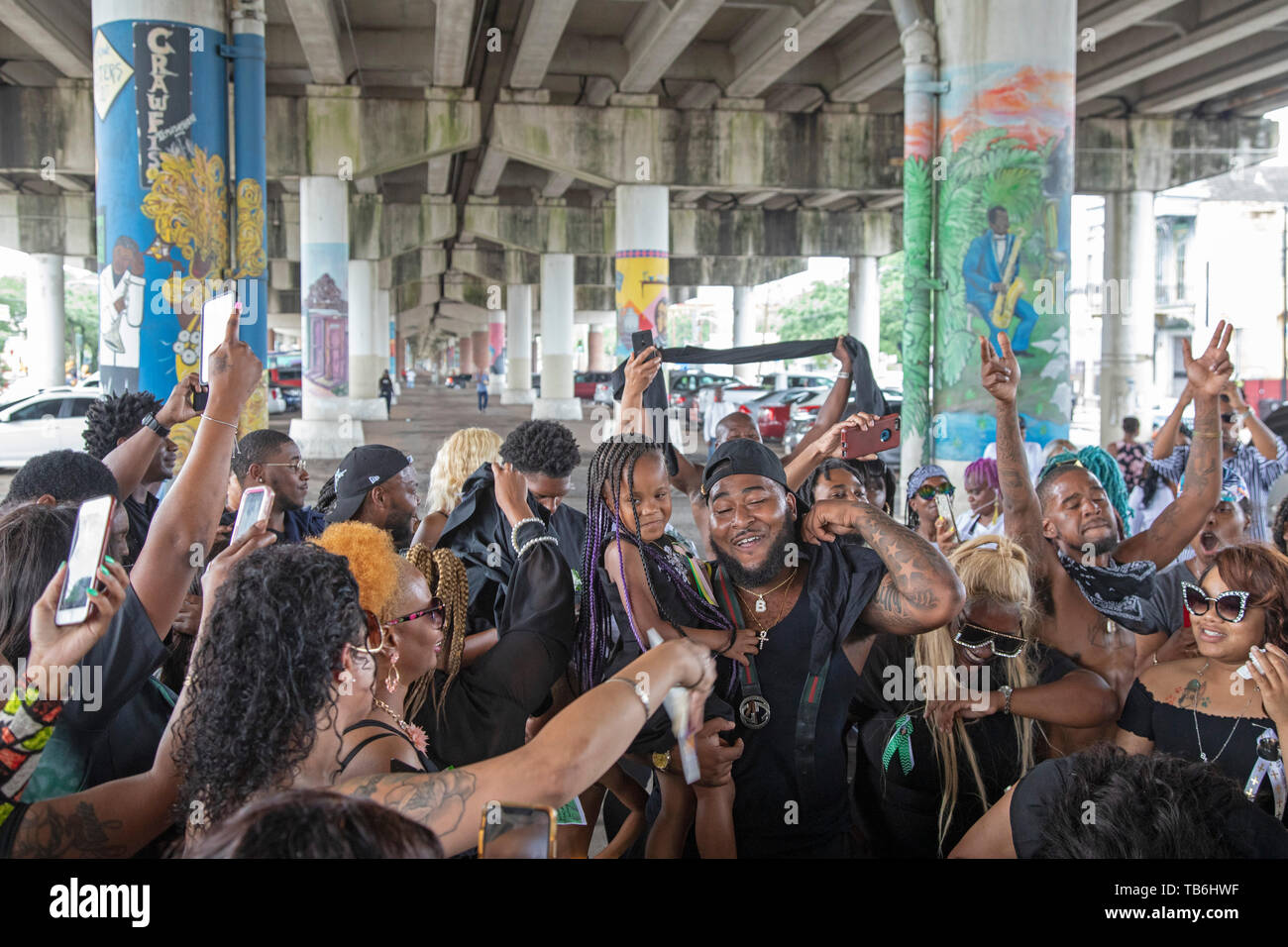 New Orleans, Louisiana A funeral procession with dancing and a brass