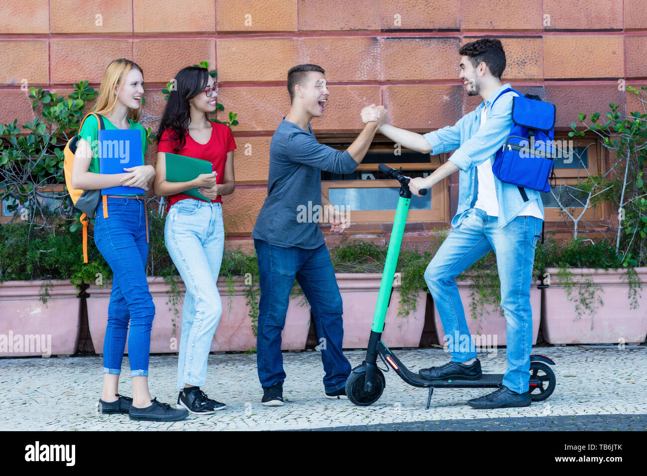 Hispanic man electric scooter hi-res stock photography and images - Alamy