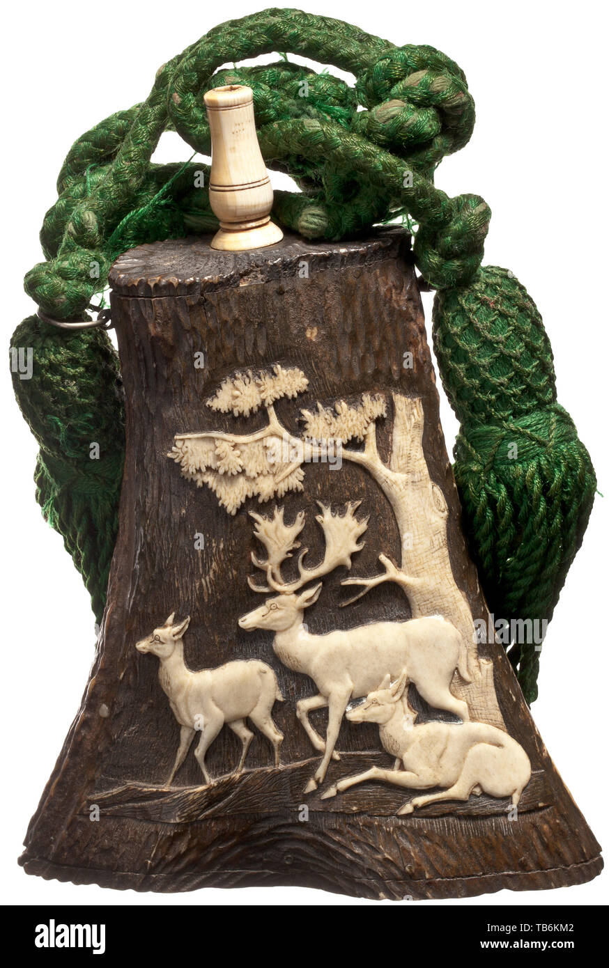A large staghorn powder flask, Thuringia, circa 1830, The body carved in one piece from a naturally grown stag horn, with an inset base and lid. On the front, a fine carving of a fallow deer stag with two fallow does under a tree. The spout made of bone. Two lateral iron strap lugs, a green carrying cord with tassels still attached. Height 19 cm. Carvings of this type are generally attributed to the workshop of Leberecht Schulz, who worked in Meiningen and Thuringia. powder flask, accessory, accessories, military, militaria, object, objects, stil, Additional-Rights-Clearance-Info-Not-Available Stock Photo