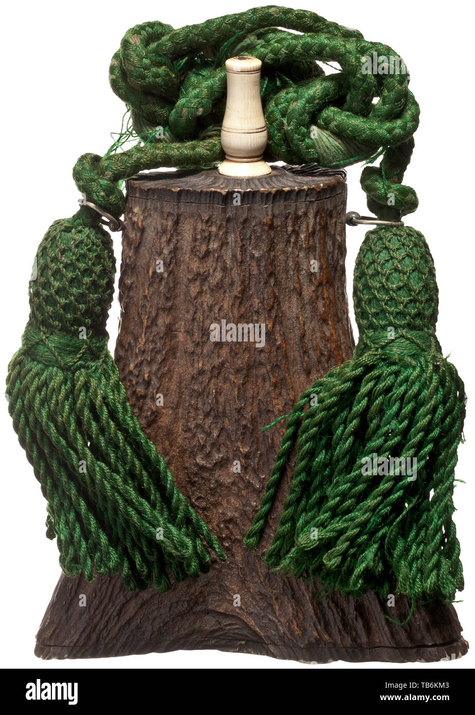 A large staghorn powder flask, Thuringia, circa 1830, The body carved in one piece from a naturally grown stag horn, with an inset base and lid. On the front, a fine carving of a fallow deer stag with two fallow does under a tree. The spout made of bone. Two lateral iron strap lugs, a green carrying cord with tassels still attached. Height 19 cm. Carvings of this type are generally attributed to the workshop of Leberecht Schulz, who worked in Meiningen and Thuringia. powder flask, accessory, accessories, military, militaria, object, objects, stil, Additional-Rights-Clearance-Info-Not-Available Stock Photo