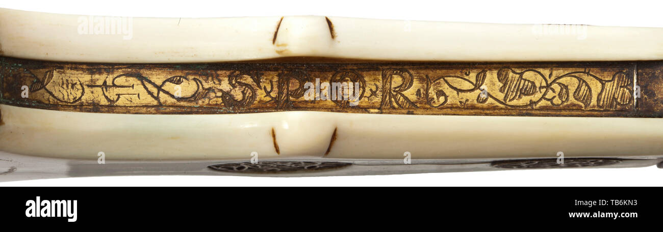 A North Italian cinquedea, circa 1500, The typical broad blade with elaborate single, double and triple fullers arranged in three registers. A lancet-shaped perforation near the point. The upper third of the blade etched with elaborate gilt decoration. A depiction of Diana and Actaeon on one side, the Birth of Venus on the other. Above, fine decorative tendrils with grotesque masks. The quillons with remnants of gilding and etched decoration of vine tendrils. Ivory grip plates with sporadic tension cracks. Openwork grip rivets with tracery. The g, Additional-Rights-Clearance-Info-Not-Available Stock Photo