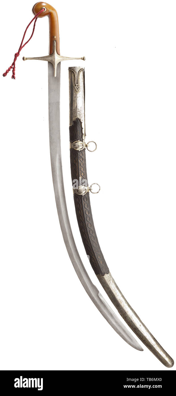 An Ottoman silver-mounted kilij, circa 1800, Curved single-edged blade of Sham Damascus with a broad, double-edged point. The quillons with geometric engravings, the grip frame of silver with riveted horn grip panels and attached hand loop. The wooden scabbard covered with shagreen leather, decorated with elaborate cord underlays and broadly stitched with silver wire, with florally engraved silver mounts and blade slit cover, the suspension bars with stylised dragon heads in relief. The scabbard mounts each stamped with the tughra of Selim III (1, Additional-Rights-Clearance-Info-Not-Available Stock Photo