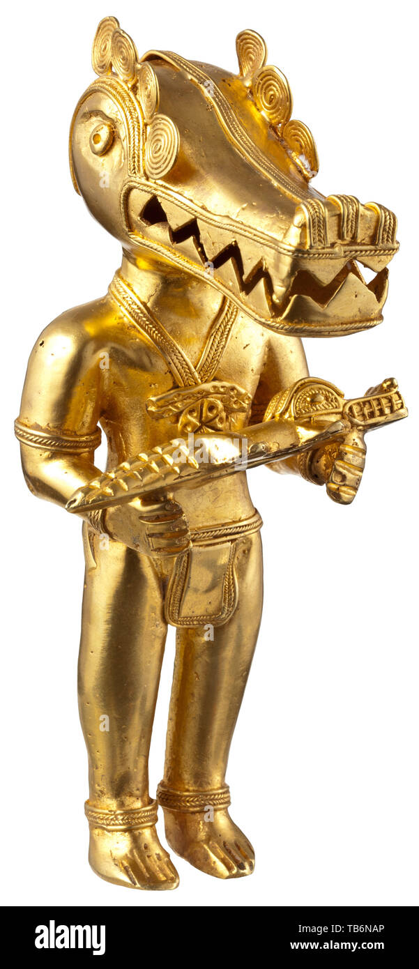 A Colombian tumbaga gold figure, Elaborately worked, hollow cast figure