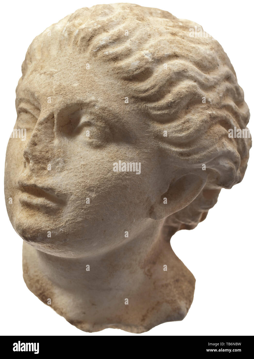 A maiden's head (nymph), sculpture from the 19th century based on a Hellenistic model, The finely crafted head of a young girl, modelled on a sculpture from the 2nd century BC. The position of the head, turned to the left, and details of the hairstyle suggest that the sculpture was inspired by the nymph in the group entitled 'Invitation to the Dance'. The right side of nose broken off, the surface slightly rough. Minimal knocks. A charming little stone sculpture. Height 15 cm. Provenance: Polish private collection, acquired by the consignor's fat, Additional-Rights-Clearance-Info-Not-Available Stock Photo