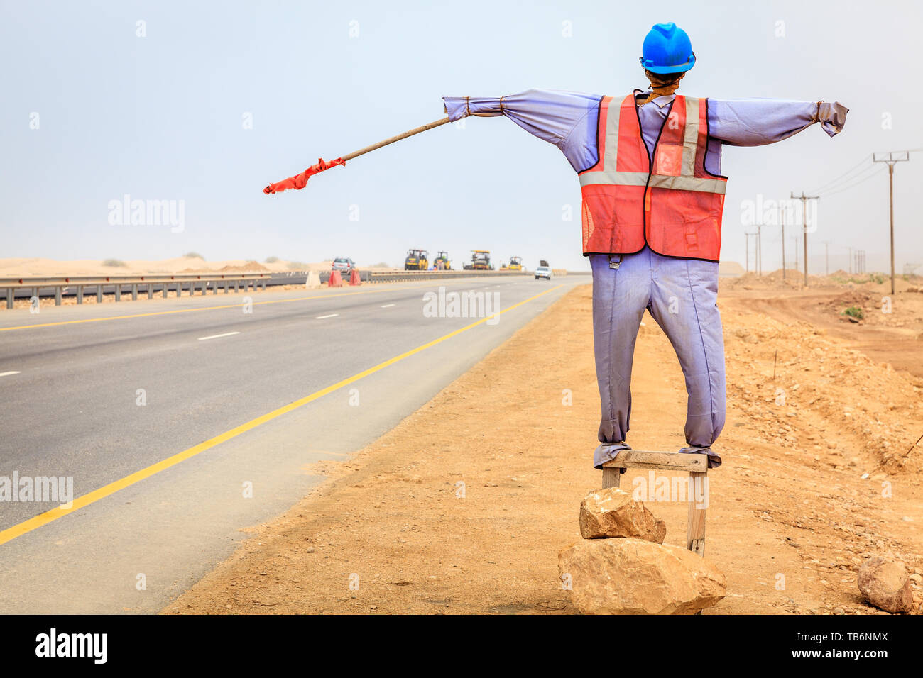 Manequin of a worker used at road construction sites in Oman Stock Photo