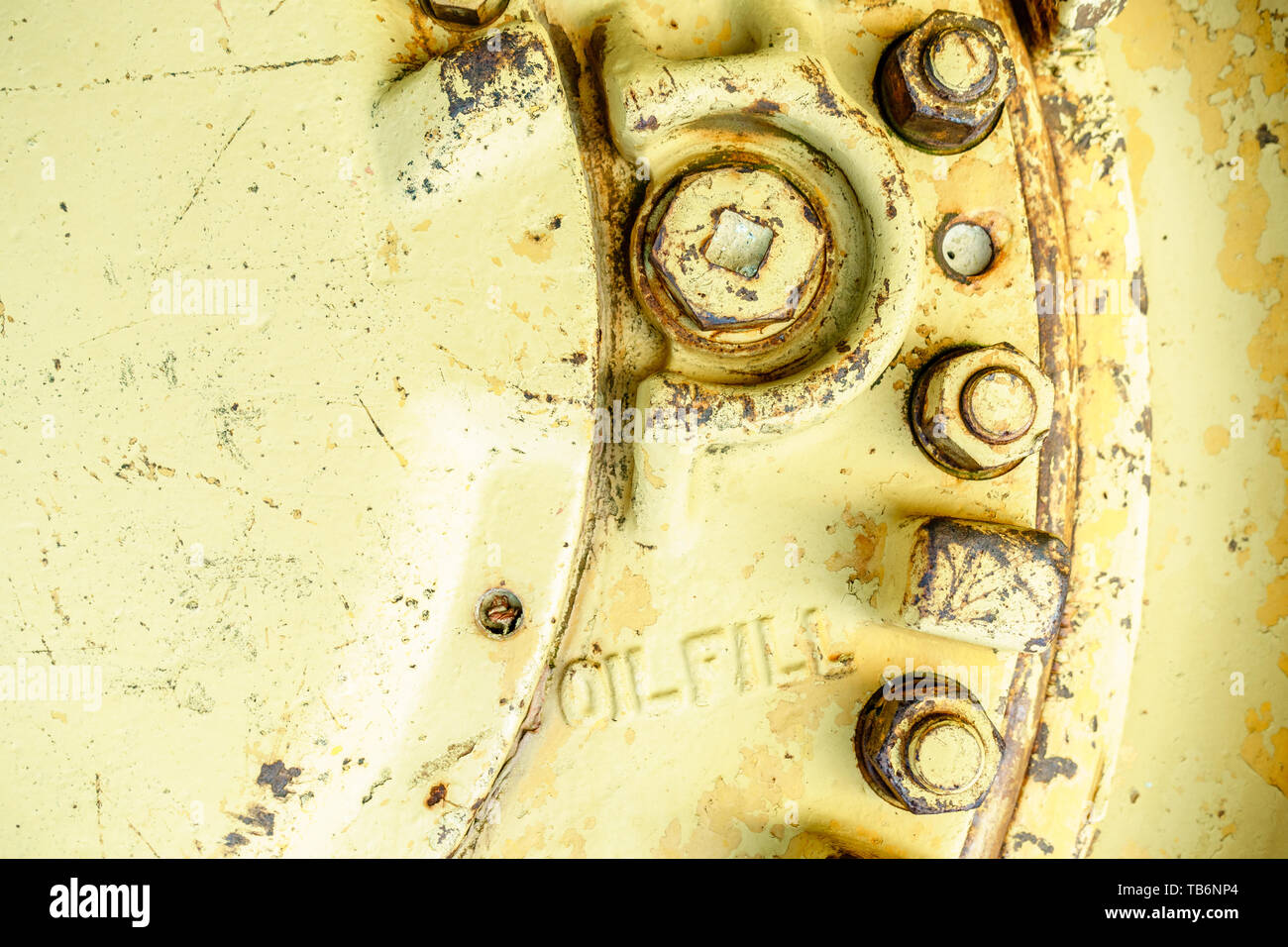 Close-up image of old machinery part with oil fill port Stock Photo