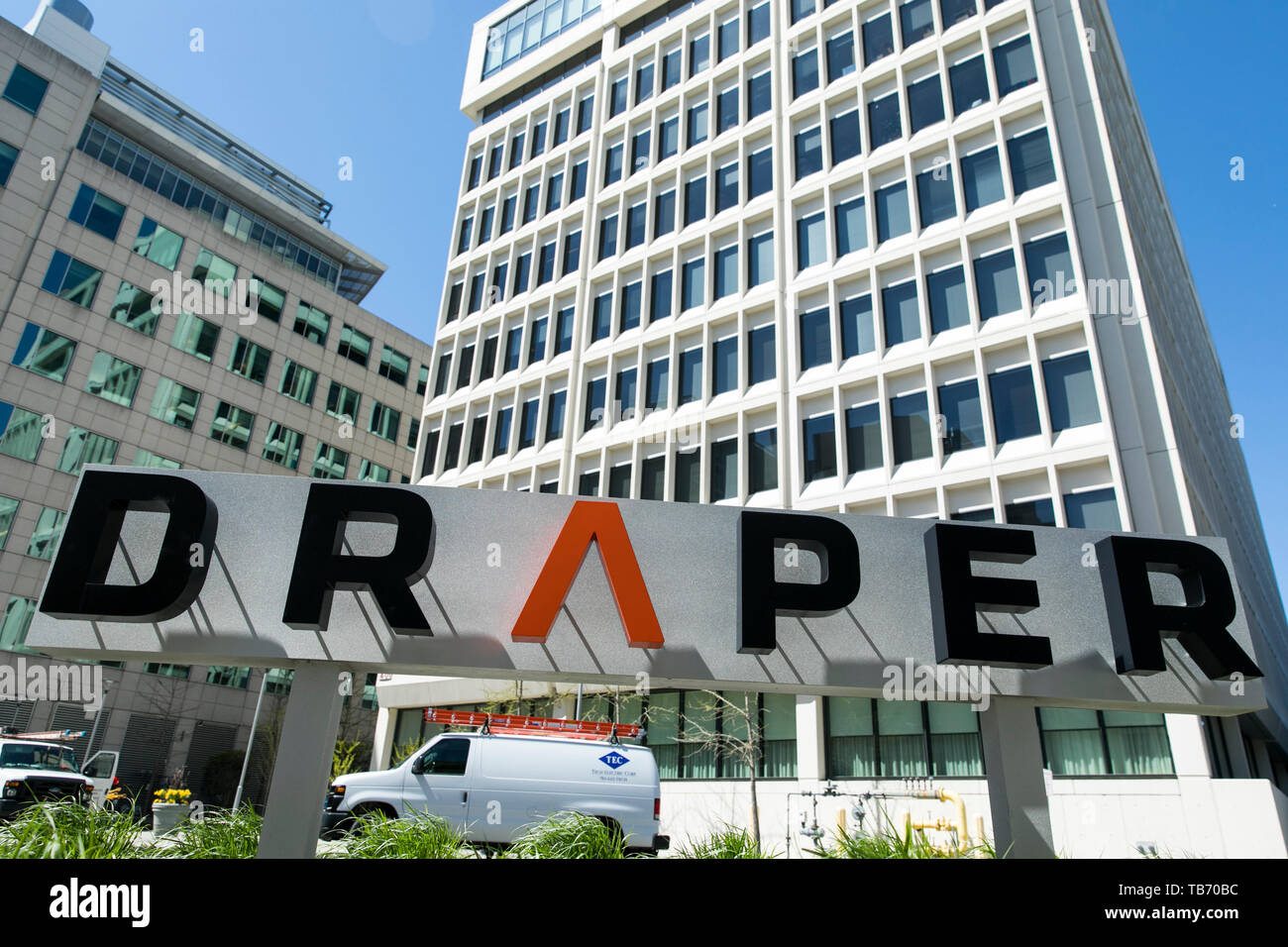 A logo sign outside of the headquarters of the Draper Laboratory in ...