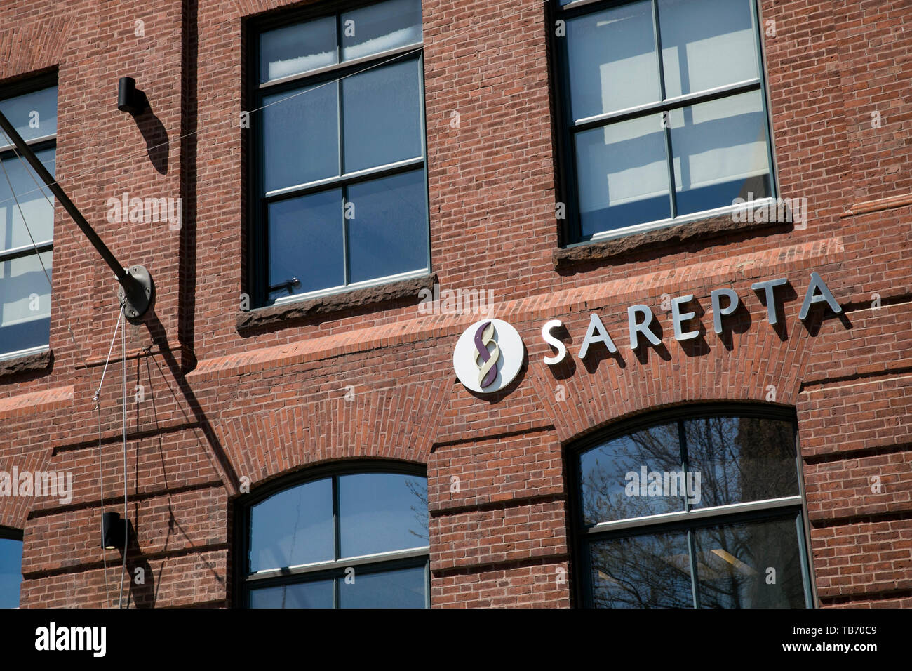 A logo sign outside of the headquarters of Sarepta Therapeutics in