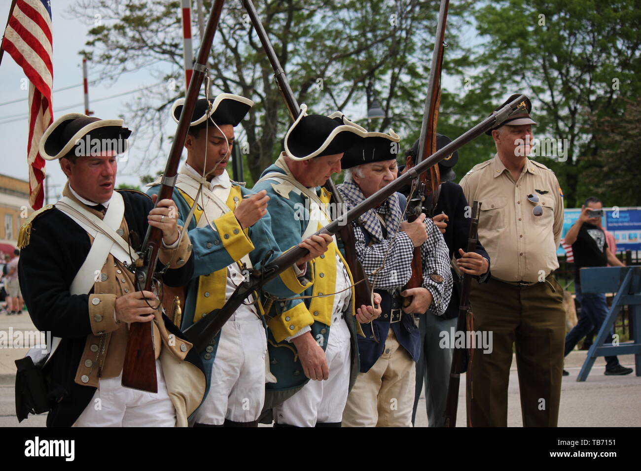 Vintage period 1700s military costumes Chicago's Northwest side Memorial Day Parade Stock Photo