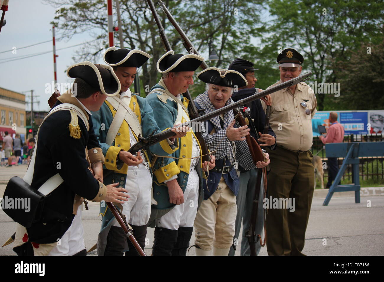 Vintage period 1700s military costumes Chicago's Northwest side Memorial Day Parade Stock Photo