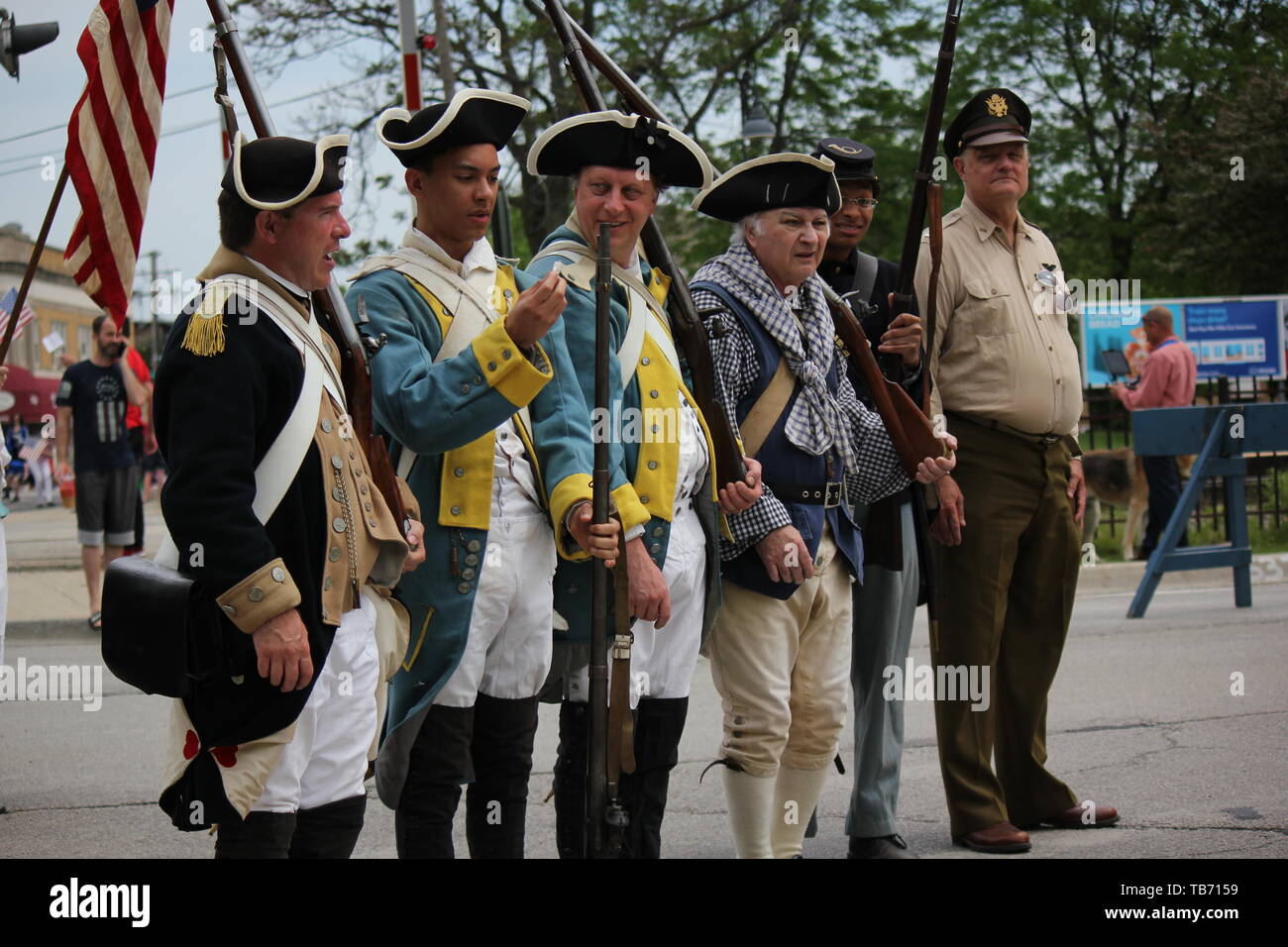 Vintage period 1700s military costumes Chicago's Northwest side Memorial Day Parade Stock Photo