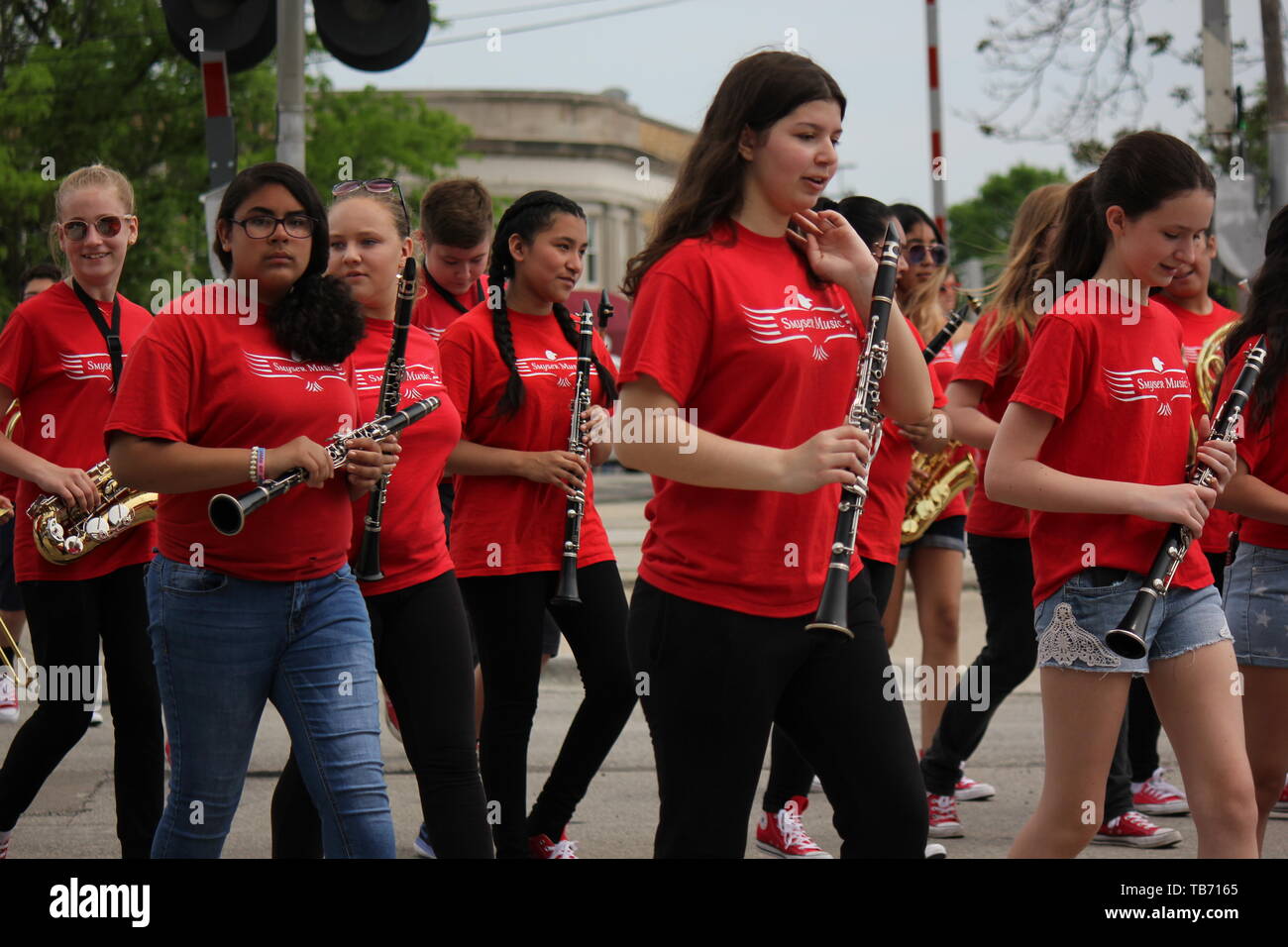 A local high school marching band playing in Chicago's Northwest side Memorial Day Parade Stock
