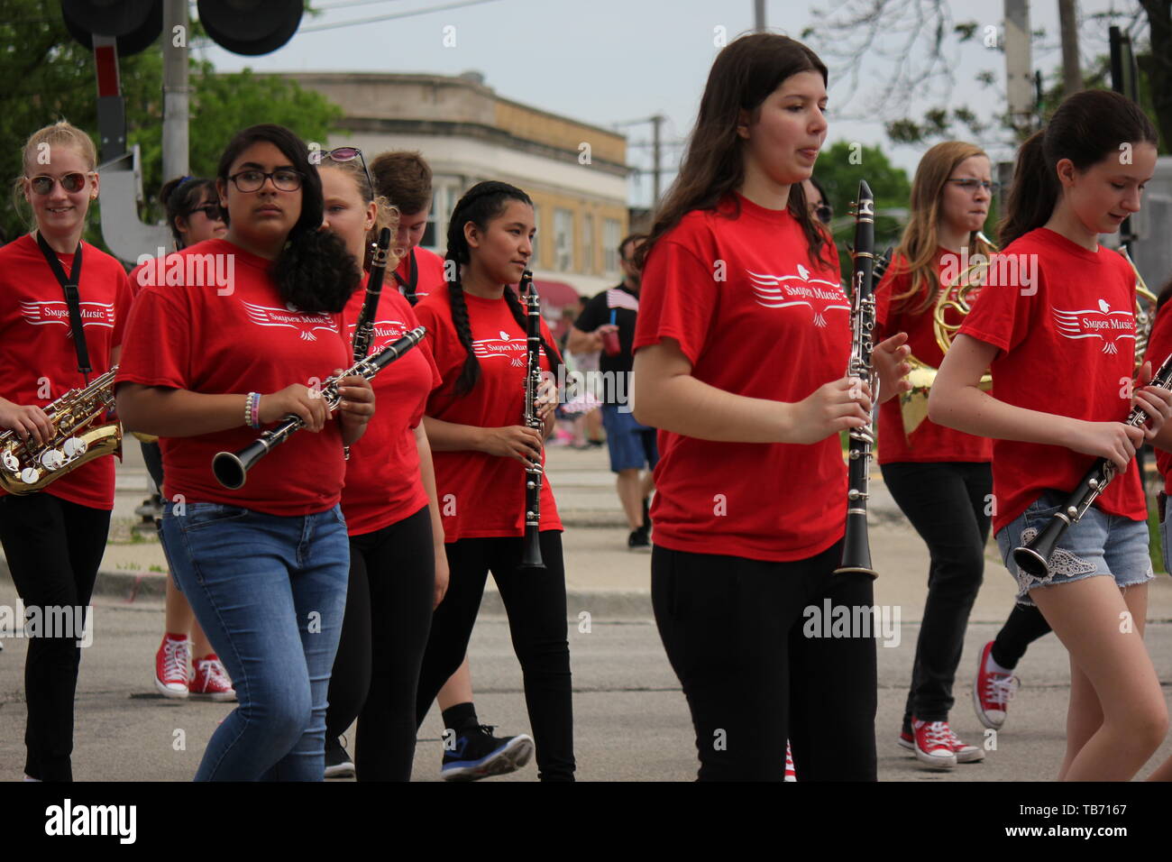 A local high school marching band playing in Chicago's Northwest side Memorial Day Parade Stock