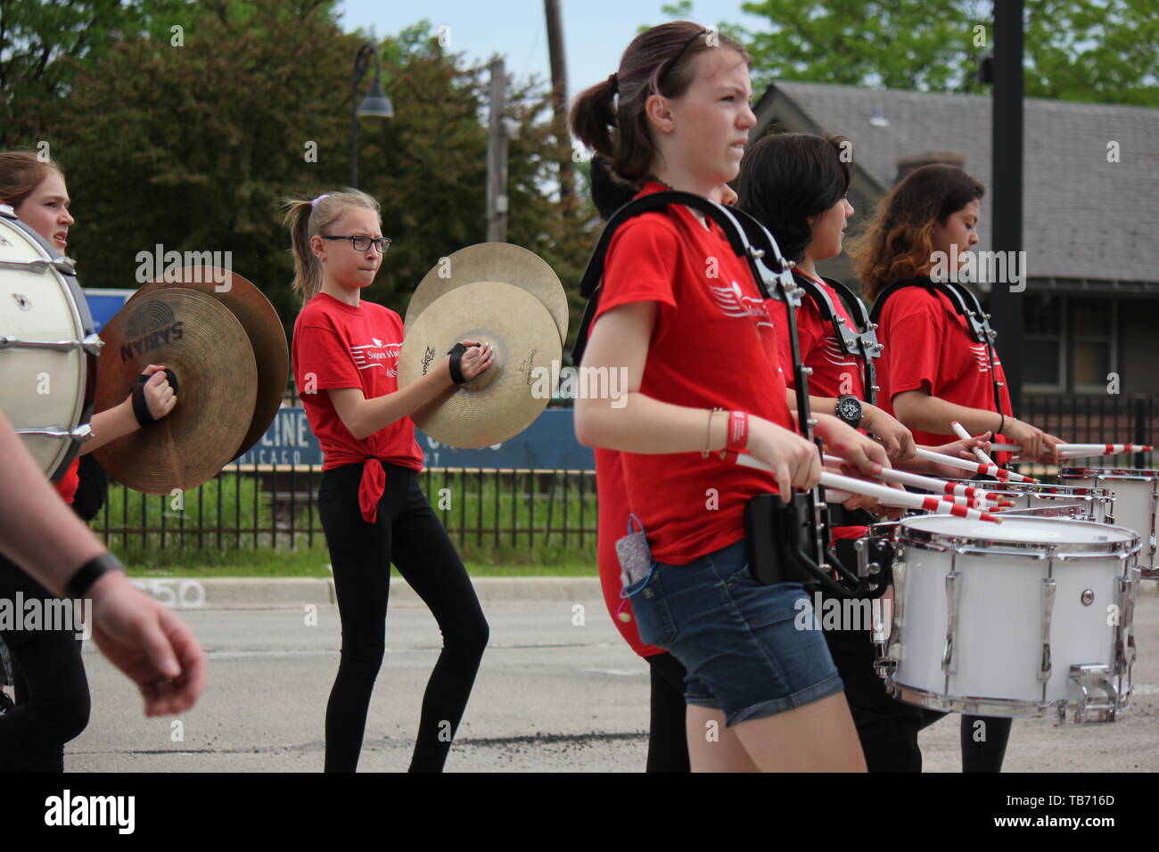 A local high school marching band playing in Chicago's Northwest side Memorial Day Parade Stock