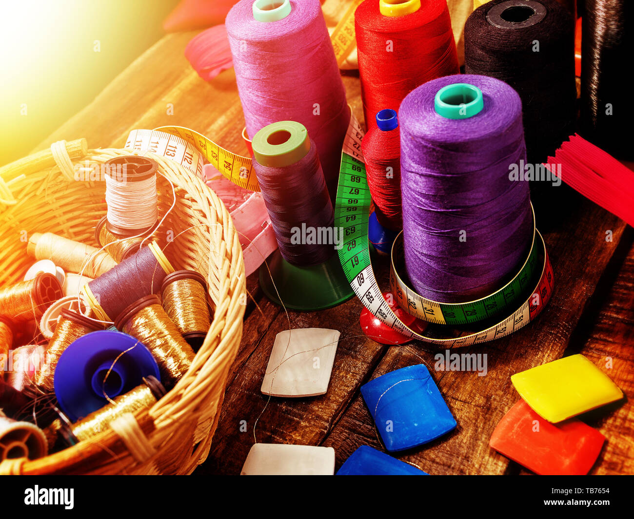 Sewing accessories fabric crayons, coil threads and measuring tape Stock Photo
