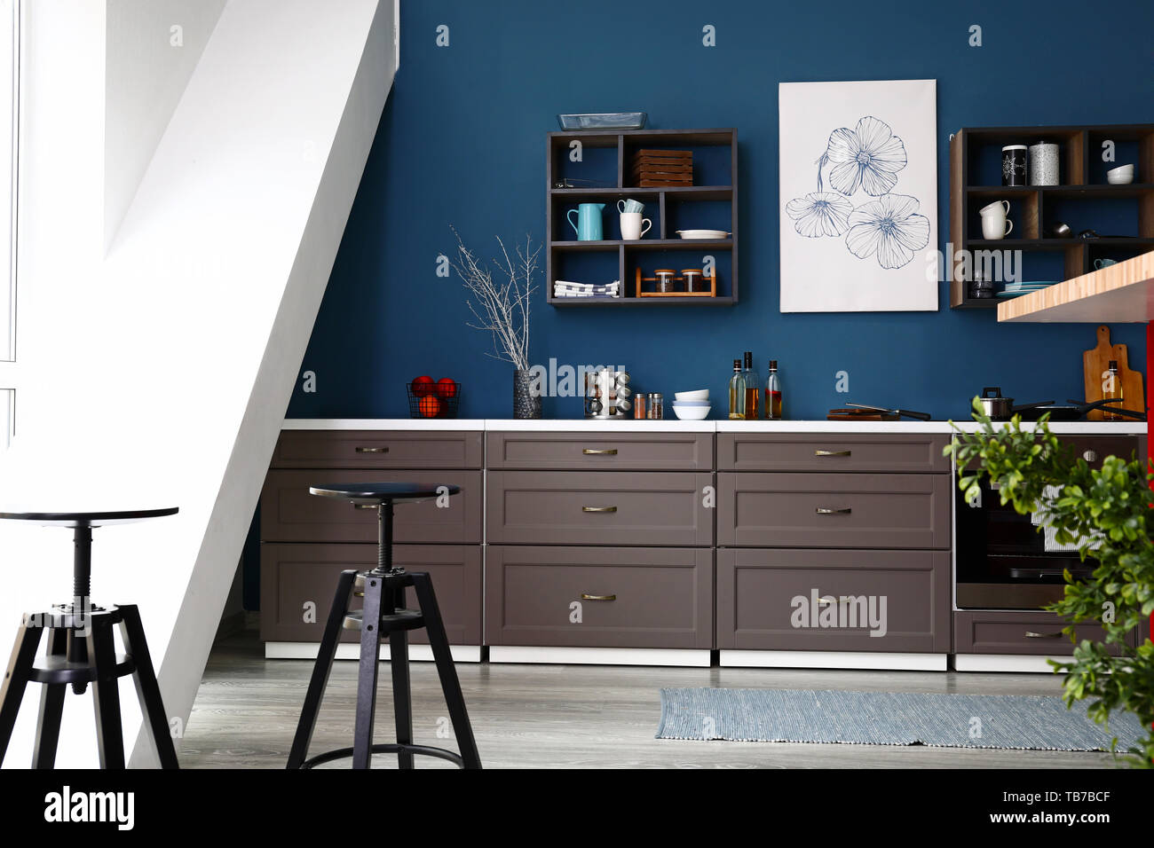 Modern interior of kitchen with stylish furniture Stock Photo - Alamy