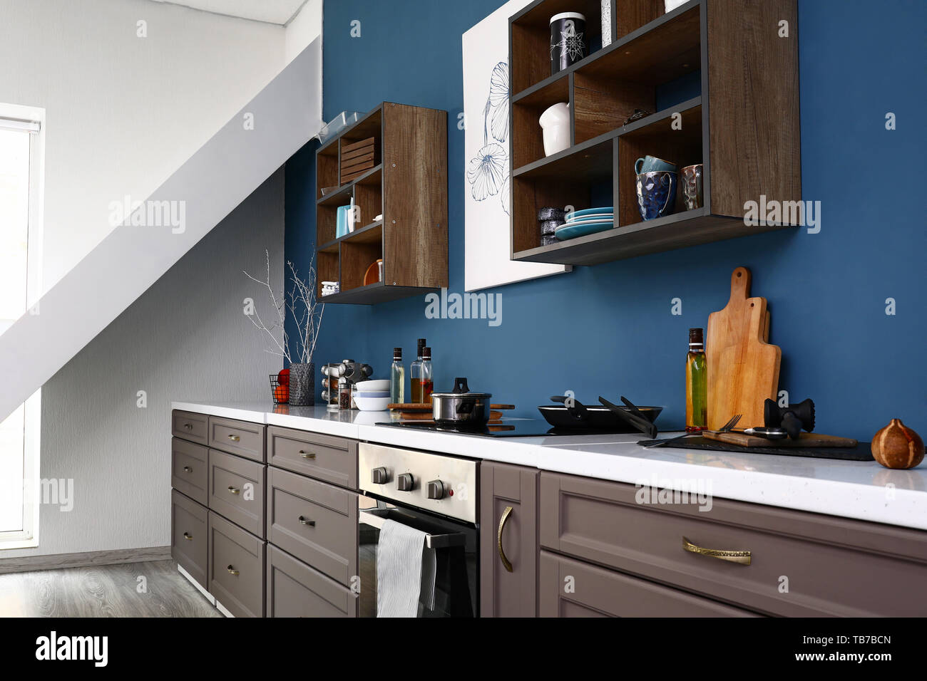 Modern interior of kitchen with stylish furniture Stock Photo - Alamy