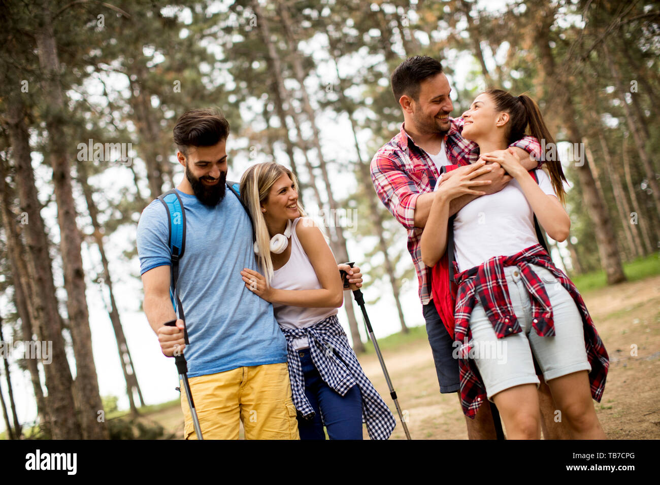 Group of young people hiking in mountain at spring day Stock Photo - Alamy