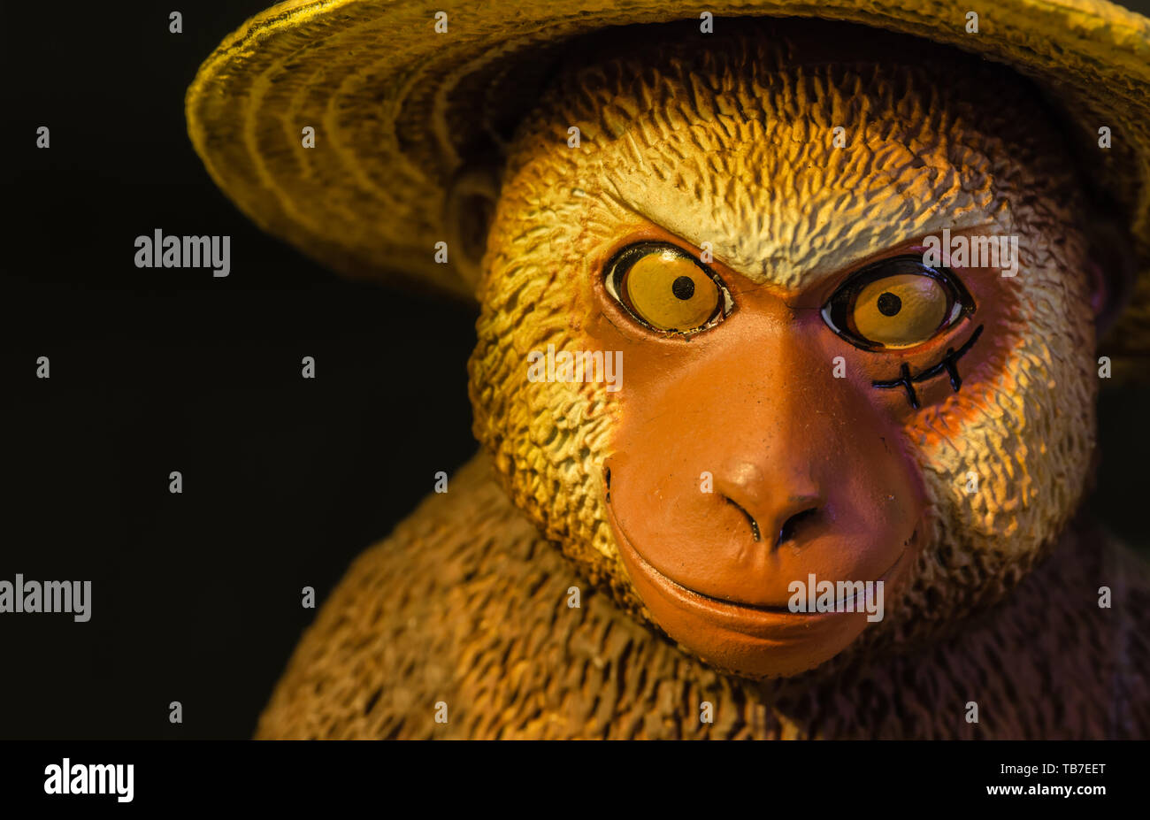 monkey figure toy head macro view Stock Photo