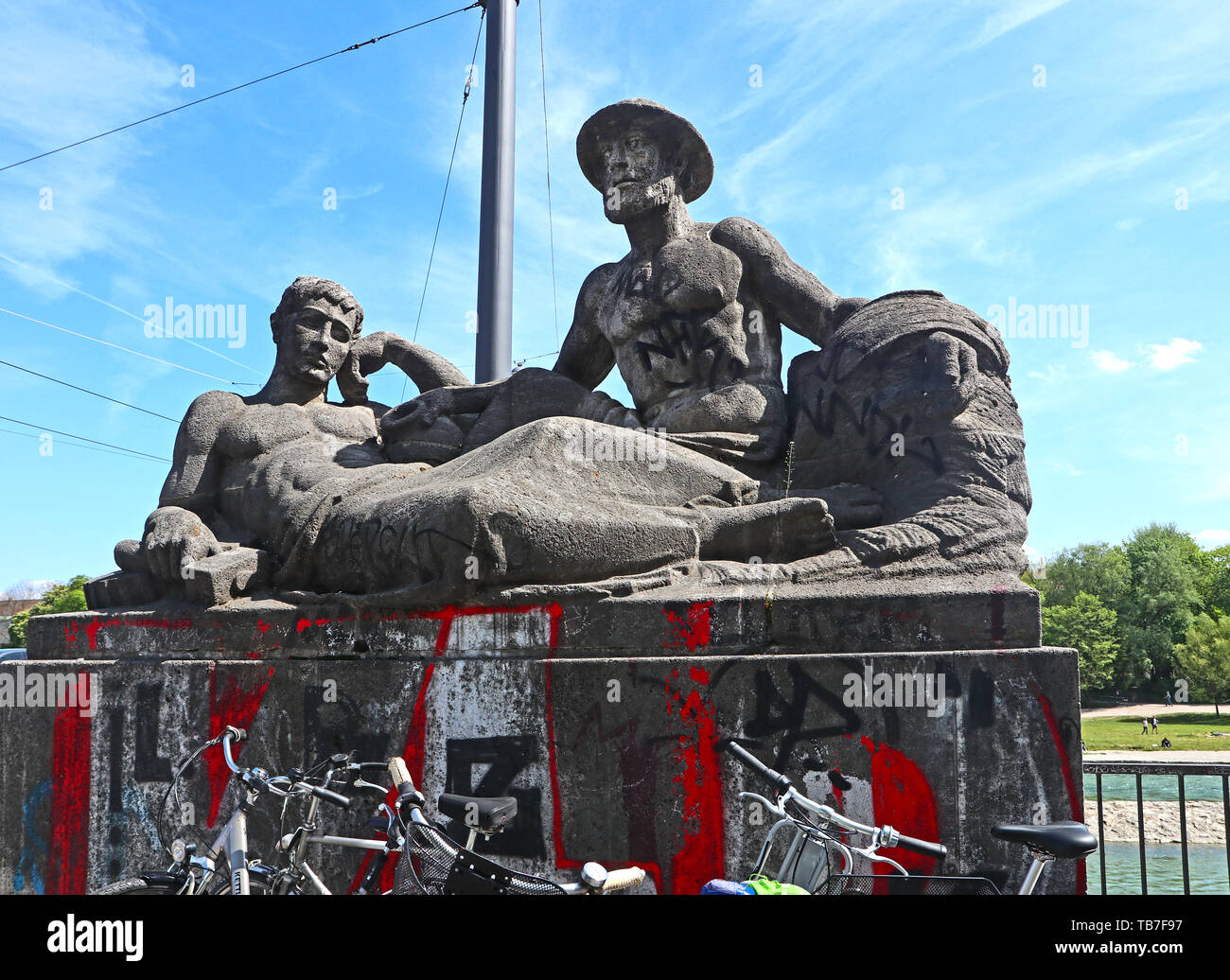MUNICH, GERMANY - MAY 2, 2019 Sculpture group dated 1925 at the SW beginning of the Reichenback bridge over the Isar river in Munich Stock Photo