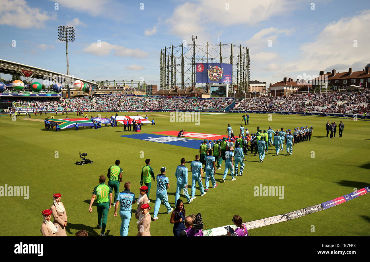 Engalnd and Pakistan players walk out onto the field before the ICC cricket World Cup group stage match at The Oval, London. Stock Photo
