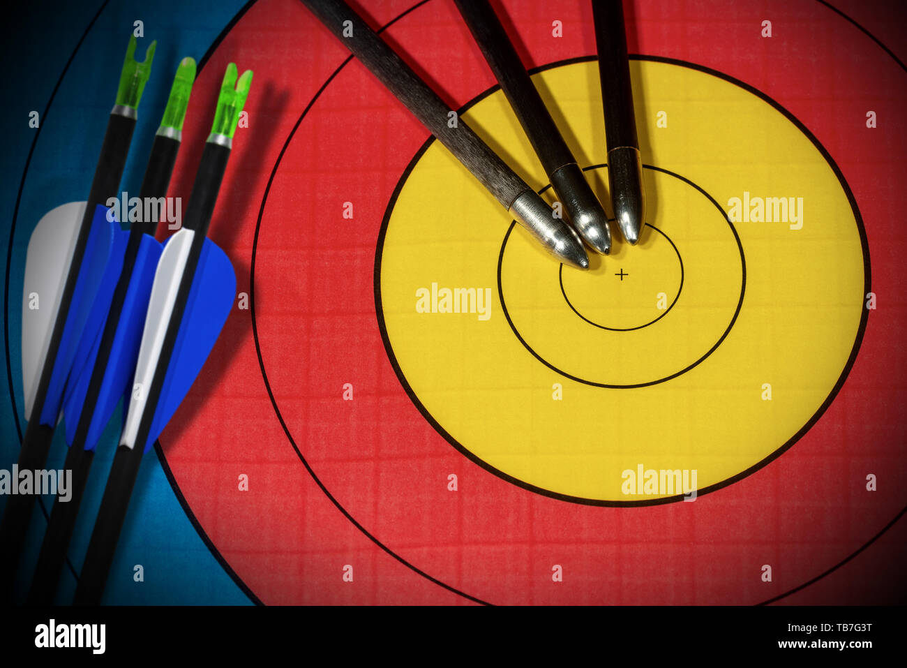 Archery sport Closeup of a target with three arrows photography Stock Photo Alamy