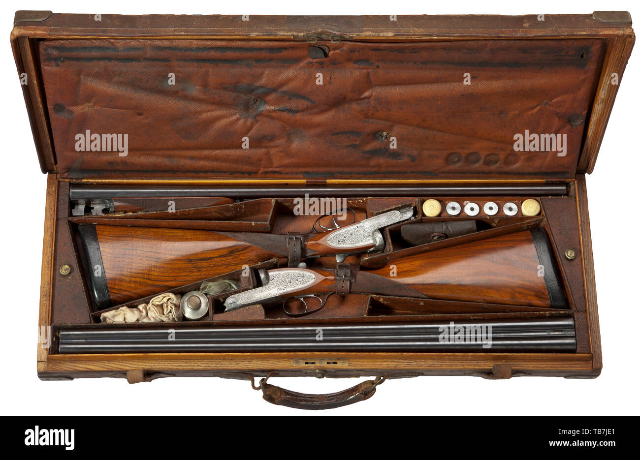 A pair of Holland & Holland side-by-side shotguns, in their case, Cal. 12/70, numbers 16049 and 16050. British proof mark and later German proof mark. Weapons on barrel and operating lever marked '1' (no. 16049) and '2' (no. 16050). Barrel length 76 cm each. Both circa 1/4-choke and cylinder bore. Barrels finished black. Manufacturer's data on barrel rib. Action with double barrel hook locking. Side locks. Double trigger. Safety slide on stock wrist. Action case in silver and shiny metallic, with vine engraving. Blued axles. Action case marked 'H, Additional-Rights-Clearance-Info-Not-Available Stock Photo