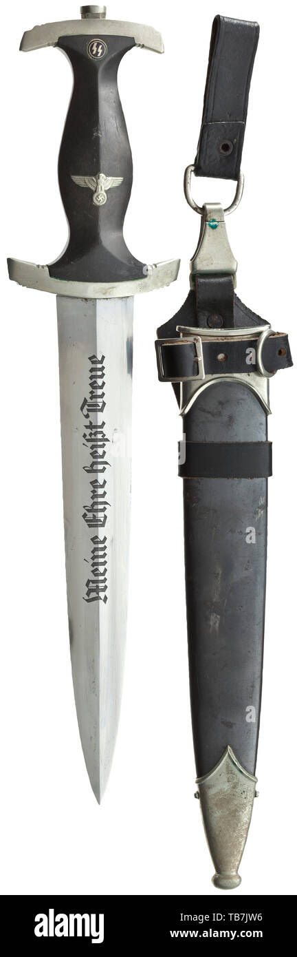 A service dagger M 34 with Röhm dedication removed in accordance with the regulations, Herder, Solingen, Blade with perfectly preserved etched dedication, manufacturer's logo of Herder, Solingen on the reverse and removed Röhm dedication. Nickel silver grip fittings, the upper one with struck SS service number '103088', the quillons with stamped 'I'. Black wooden grip with inlaid national eagle and enamelled SS emblem. Steel scabbard with black finish and nickel silver fittings. Vertical steep hanger of black leather, stamped 'SS 48/34 RZM' on the inside, the clip with Assm, Editorial-Use-Only Stock Photo