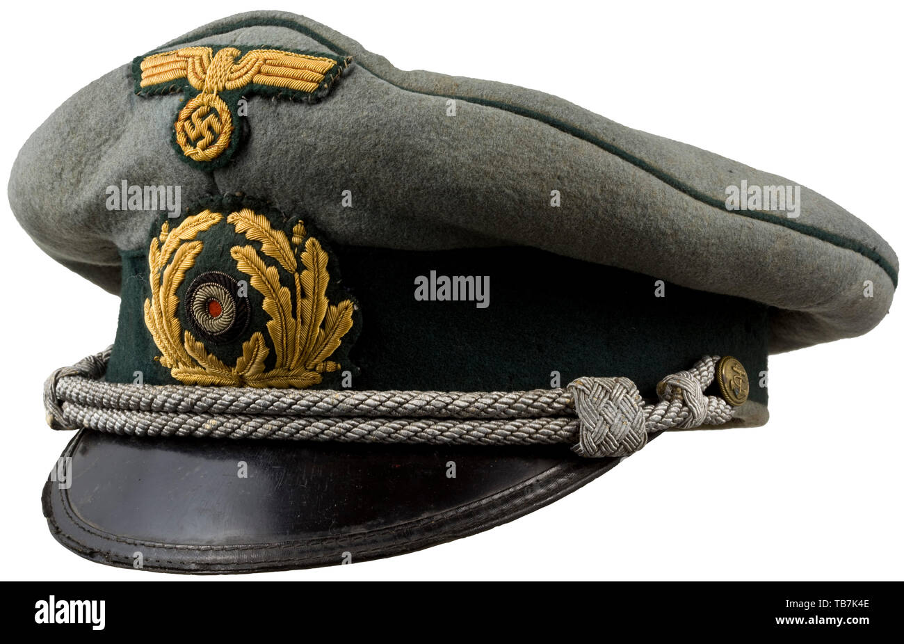A visor cap to the field-grey uniform of officers of the coast artillery, Field-grey wool felt with dark-green cap band and piping, visor lacquered in black, yellow silk lining with cap trapezoid (damaged) and brown leather sweatband. Hand-stitched cellon insignia embroidered in gold on dark-green cloth, silver cap cord attached to golden anchor buttons. Frequently worn cap with unquestionable patina. navy, naval forces, military, militaria, branch of service, branches of service, armed forces, armed service, object, objects, stills, clipping, clippings, cut out, cut-out, c, Editorial-Use-Only Stock Photo