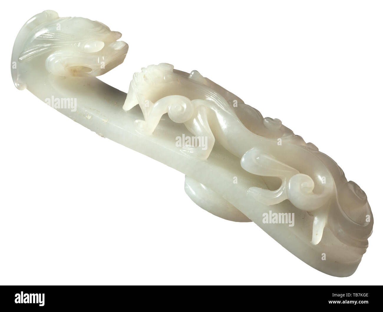 A Chinese jade 'Dragon' belt hook, Qing dynasty, 18th century, Curved belt hook of greenish-white jade with pierced dragon at top. Length 13.2 cm. China, Chinese, historic, historical, Additional-Rights-Clearance-Info-Not-Available Stock Photo