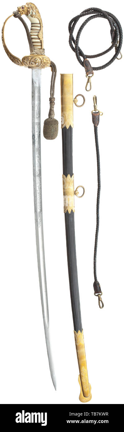 U-Boat commander (U-446) Oberleutnant Helmuth-Bert R. - a sabre for officers in deluxe issue with lion-headed pommel, Nickel-plated iron blade, both sides with maritime etchings, in-struck maker's mark of the 'WKC' firm. White plastic grip with wire wrap, fire-gilt hilt with lion's head and glass eyes, two folding hinges, original portepee. Leather scabbard with three gilt brass fittings, two carry rings and long plaited leather hangers. Length 89 cm. In used, very good condition. navy, naval forces, military, militaria, branch of service, branches of service, armed forces,, Editorial-Use-Only Stock Photo