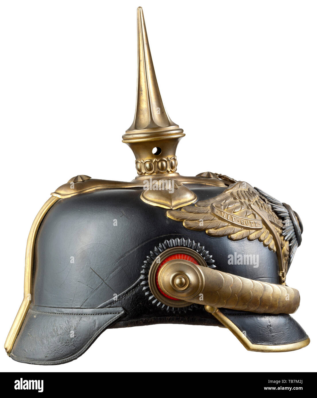 A helmet M 1871/97 for generals, Leather body (crazed, slightly sunken) with guard eagle and enamelled guard star which bears the motto 'Suum Cuique' and the black Hohenzollern eagle on a gold background. All brass fittings with darkened gilding, the cruciform base with beaded band mount, unscrewable spike with sixfold fluting, 22 mm star screws. Angular front visor, convex chain-linked chin scales, leather strap with eyelet, officer's cockades, smooth back spline without ventilation, the green and red underlay on front and rear visor with heavy warpage. Rep silk liner miss, Editorial-Use-Only Stock Photo
