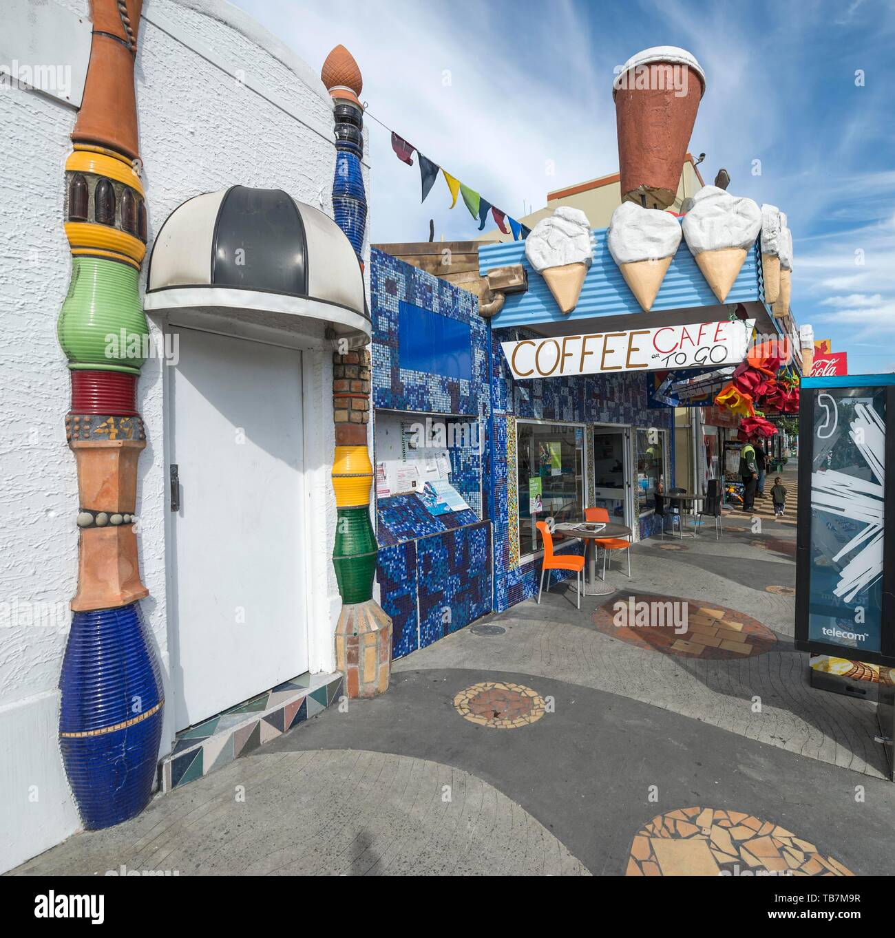 Outdoor area of the public toilet of the artist and architect Friedensreich Hundertwasser with columns and ceramic tiles, Kawakawa, North Island, New Stock Photo