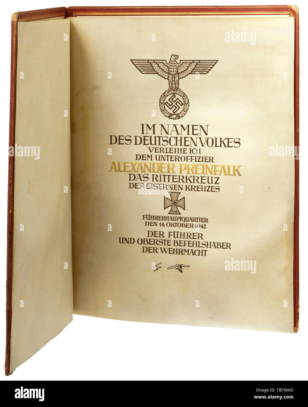 Oberfeldwebel Alexander Preinfalk - an award document for the fighter pilot with folder to the Knight's Cross of the Iron Cross of 1939, Large, double-paged parchment document with calligraphic national eagle and text dated 14 October 1942, the name of Alexander Preinfalk rendered in hand-executed gold lettering, beneath which is the signature in ink of Adolf Hitler. Slightly stained. Dimensions 43.3 x 35 cm. The award folder in red leather with a gold-embossed eagle on the front, the inside with decorative gold lines and parchment inserts, at the lower right edge the signa, Editorial-Use-Only Stock Photo