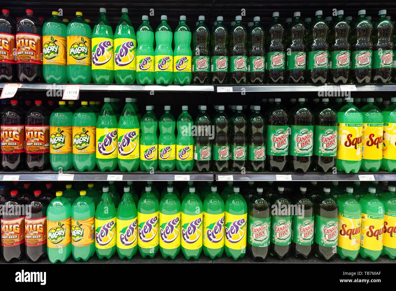 Pet bottles, soft drinks, beverage bottles in a supermarket shelf, Liberia, Guanacaste province