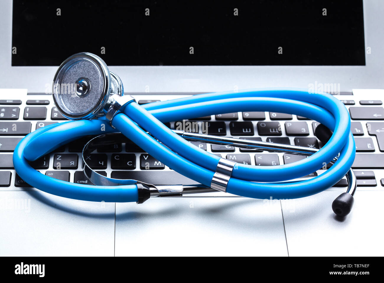 Medical stethoscope on computer keyboard Stock Photo - Alamy