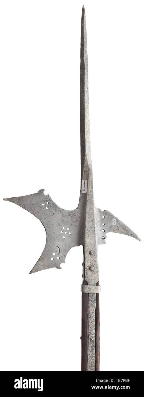 A German halberd, circa 1580, Short spike, concave axe blade pierced with dots, rear fluke with smith mark and dot-shaped openwork. Angular socket with reinforcement ring and four side straps. Carved original staff. Cleaned iron parts. Length 221 cm. pole weapon, weapons, arms, weapon, arm, fighting device, military, militaria, object, objects, stills, clipping, clippings, cut out, cut-out, cut-outs, metal, historic, historical 16th century, Additional-Rights-Clearance-Info-Not-Available Stock Photo