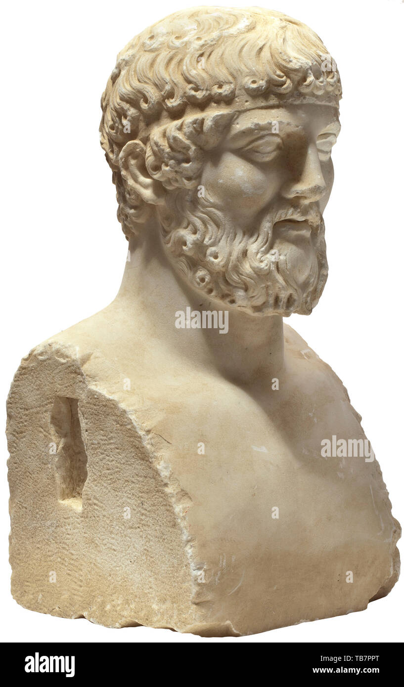 A marble herm of a bearded deity, superbly crafted copy from the 19th century based on an early Classical model, Wearing a band in his hair. The arrangement of the curls is inspired by the early classical Greek sculpture. Surface slightly tinted with minimal dents, otherwise in excellent condition. Height 47, width 24.5 cm. Provenance: Polish private collection, acquired by the consignor's father in the 1960s and 1970s from an art dealer. historic, historical 19th century, Additional-Rights-Clearance-Info-Not-Available Stock Photo