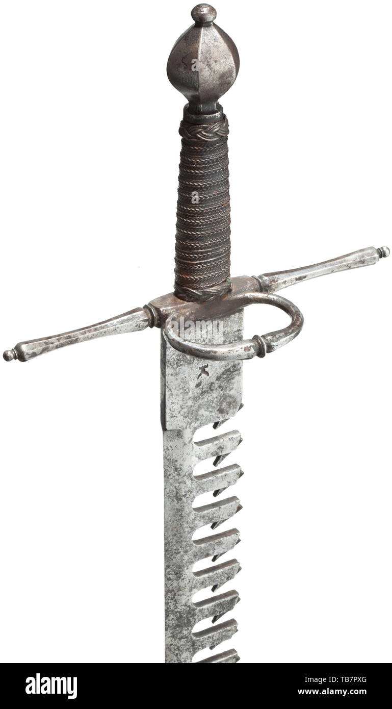 A left-hand dagger with sword breaker, historicism in the style of circa 1600, Sturdy, single-edged blade with ridged point and smith mark on one side of the ricasso. The serrated back with twelve recesses. Chiselled quillons, one side ring, the grip with iron wire wrapping, Turk's heads and faceted iron pommel. Length 49.3 cm. dagger, daggers, thrusting, thrustings, baton, weapon, arms, weapons, arms, fighting device, object, objects, stills, clipping, cut out, cut-out, cut-outs, historic, historical 19th century, Additional-Rights-Clearance-Info-Not-Available Stock Photo