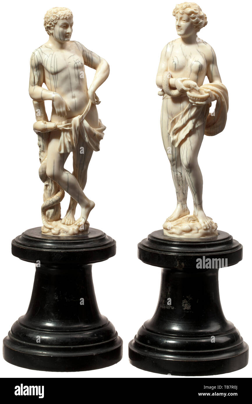 A German Asclepius and Hygieia, 17th/18th century, A pair of finely carved, fully sculptured ivory figures. Antique-like depiction of the Greek god of medicine and healing, his right arm supported on a staff entwined with a serpent (rod of Asclepius). The figure of Hygieia, goddess of health and daughter of Asclepius, is portrayed with a snake and a bowl. Each statuette on an oval plinth. The figure of Hygieia with a restored crack at the ankle, damage to the tail of the snake. The figure of Asclepius with a small defect on the right biceps. On t, Additional-Rights-Clearance-Info-Not-Available Stock Photo