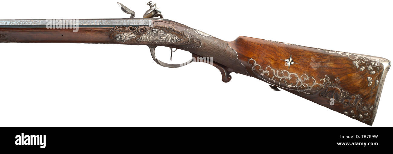 King Friedrich I of Württemberg - a pair of flintlock shotguns, by Christian Körber in Ingelfingen, circa 1810, Octagonal, blued and richly silver inlaid smooth barrels in 15 mm calibre, gold-lined vent holes, signed at top. Fine flint locks polished on the in 19th century, Additional-Rights-Clearance-Info-Not-Available Stock Photo