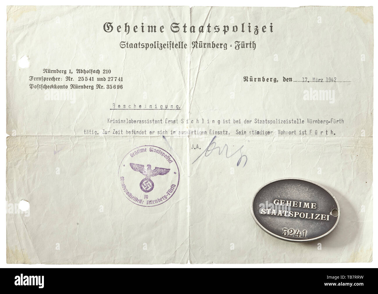 Kriminalsekretär Ernst Sichling - GESTAPO '3241' badge of office and documents, The badge in nickel-silver with the national eagle in relief and the inscription 'Geheime Staatspolizei' in the characteristic type face, below the stamped number '3241' above a raised line. Dimensions 37 x 51 mm. Promotion documents to Unterwachtmeister in the Free State o 20th century, Editorial-Use-Only Stock Photo