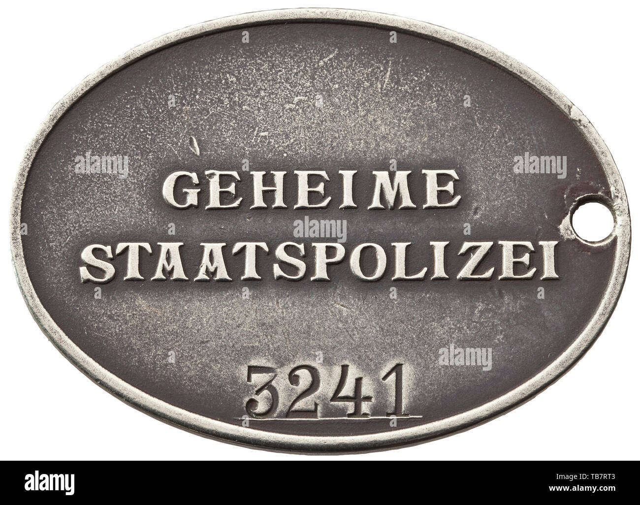 Kriminalsekretär Ernst Sichling - GESTAPO '3241' badge of office and documents, The badge in nickel-silver with the national eagle in relief and the inscription 'Geheime Staatspolizei' in the characteristic type face, below the stamped number '3241' above a raised line. Dimensions 37 x 51 mm. Promotion documents to Unterwachtmeister in the Free State o 20th century, Editorial-Use-Only Stock Photo